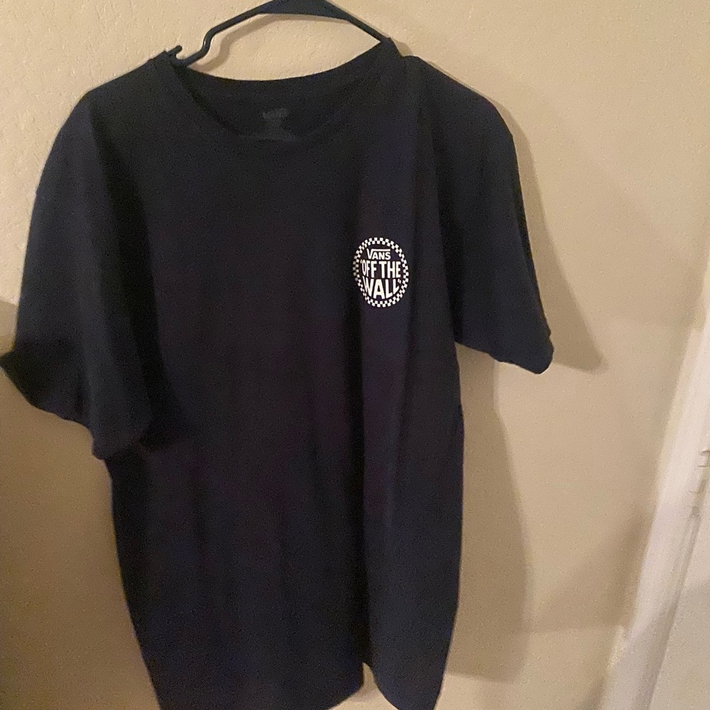 Dark blue vans shirt.